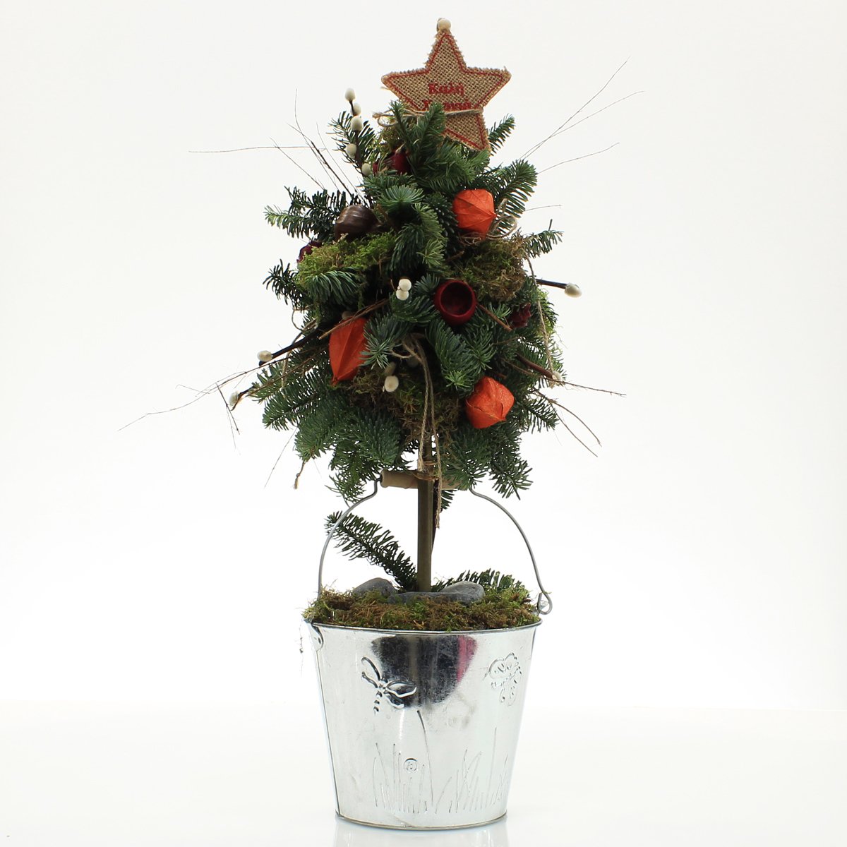 Arrangement with fresh fir in tree shape