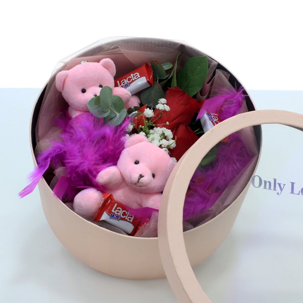 Box with flowers, teddy and chocolates